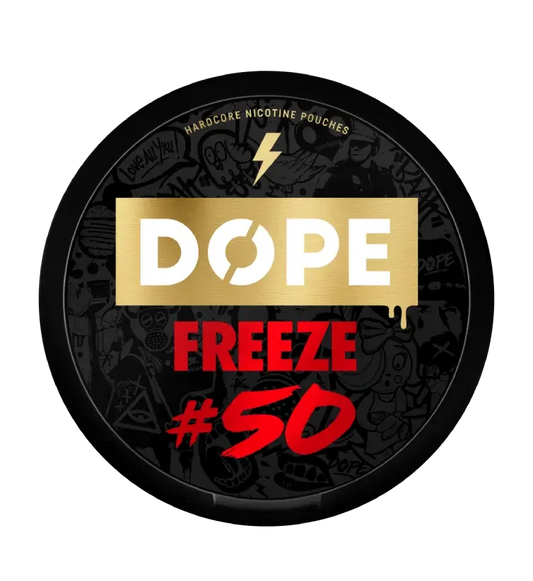 Round black tin of nicotine pouches labeled DOPE with a gold background, featuring FREEZE #50 in red text below.