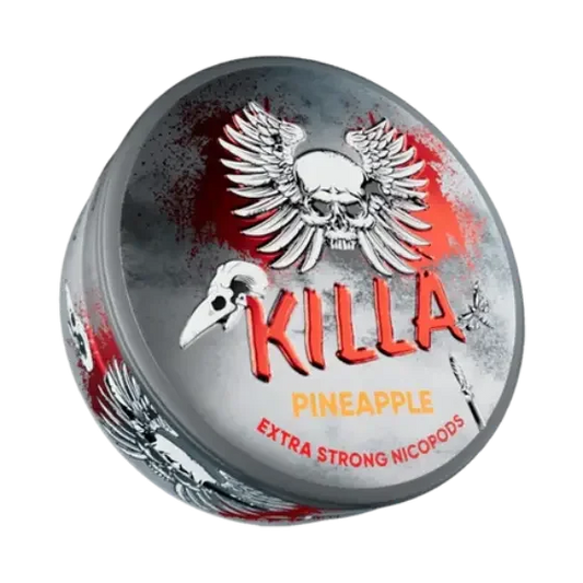 A round silver container with red paint splatter effect of KILLA Pineapple nicotine pouches. The lid design features a bold red KILLA logo, a winged skull, a raven skull, a butterfly, and a dagger.