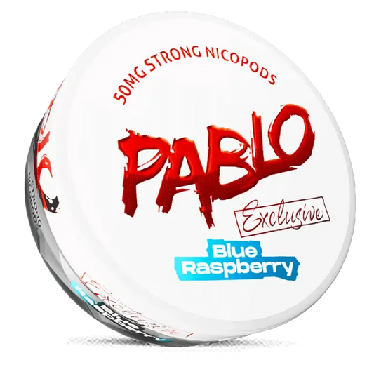 A round white container of PABLO Exclusive Blue Raspberry nicotine pouches. The lid features a bold red PABLO logo with brushstroke style and Blue Raspberry in a blue banner at the bottom.