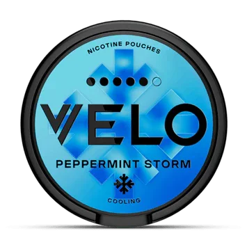 Round blue container of Peppermint Storm Velo Nicotine Pouches with black rim.