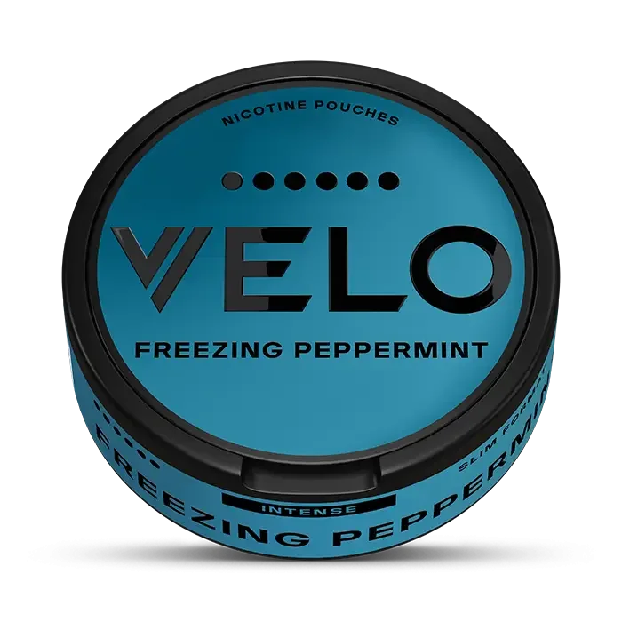 Velo Freezing Peppermint nicotine pouches tin with a blue label and five-dot intensity indicator on the lid.