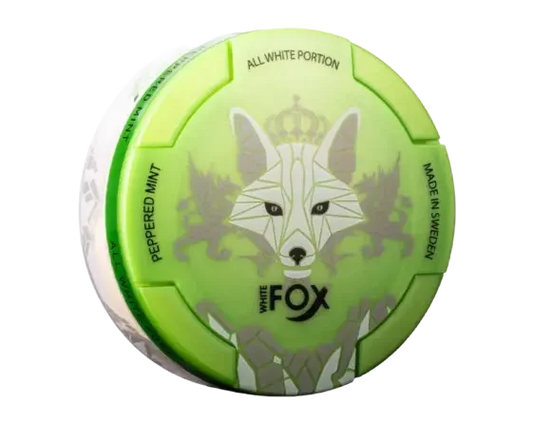 A green and white round container labeled White Fox with a stylised fox design. Text reads Peppered Mint, All White Portion Made in Sweden”.