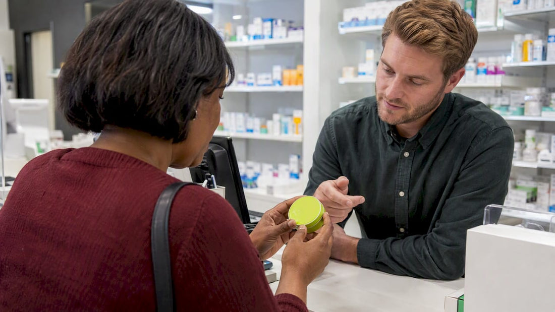 Buyer checks a pouch tin with pharmacist