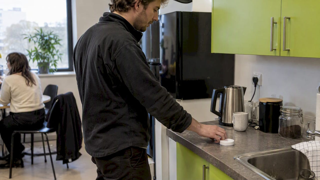 Man reaching for a pouch tin during break